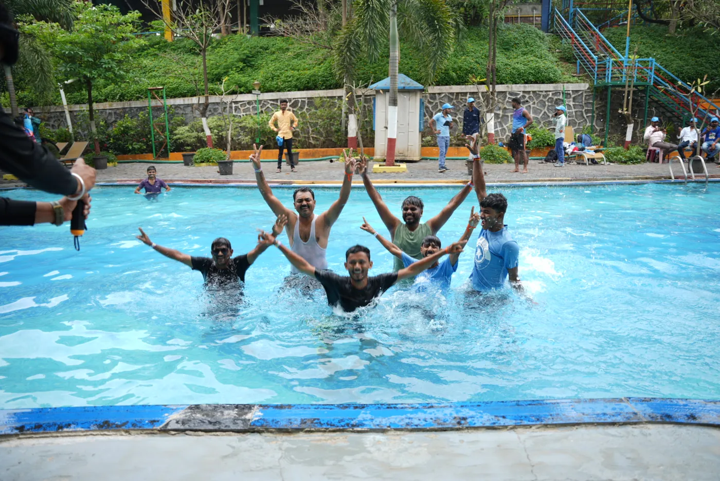 Team cooling off and having fun in the resort pool